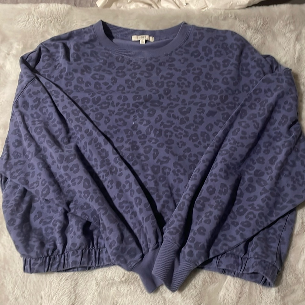 Blue cheetah Zsupply pullover sinched at bottom slightly